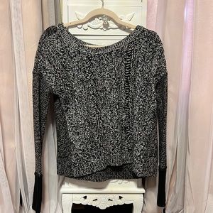 A multicolor black and white sweater
